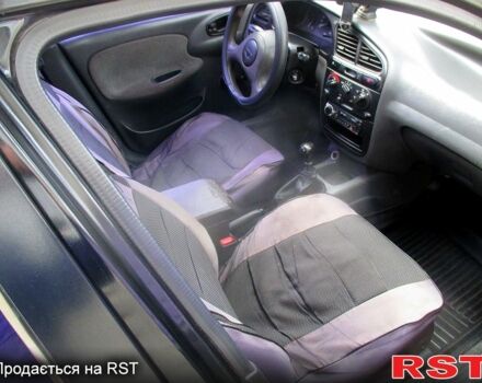 Черный Дэу Ланос, объемом двигателя 1.5 л и пробегом 230 тыс. км за 2000 $, фото 7 на Automoto.ua