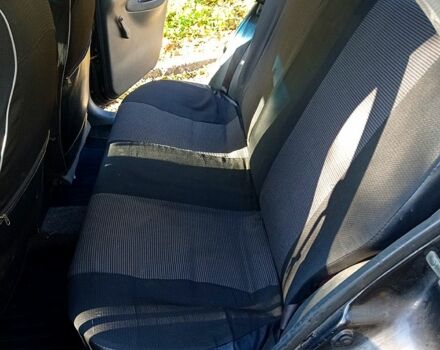 Черный Дэу Ланос, объемом двигателя 1.5 л и пробегом 365 тыс. км за 2000 $, фото 7 на Automoto.ua