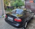 Черный Дэу Ланос, объемом двигателя 1.6 л и пробегом 139 тыс. км за 2350 $, фото 2 на Automoto.ua