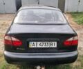 Черный Дэу Ланос, объемом двигателя 1.5 л и пробегом 300 тыс. км за 1900 $, фото 1 на Automoto.ua