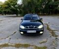 Черный Дэу Ланос, объемом двигателя 1.5 л и пробегом 239 тыс. км за 2200 $, фото 1 на Automoto.ua