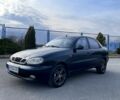 Черный Дэу Ланос, объемом двигателя 1.5 л и пробегом 216 тыс. км за 1650 $, фото 1 на Automoto.ua