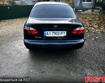 Черный Дэу Ланос, объемом двигателя 1.4 л и пробегом 220 тыс. км за 1800 $, фото 5 на Automoto.ua