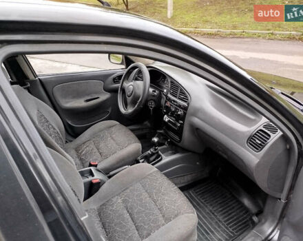 Черный Дэу Ланос, объемом двигателя 1.5 л и пробегом 350 тыс. км за 1800 $, фото 7 на Automoto.ua