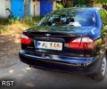 Черный Дэу Ланос, объемом двигателя 1.6 л и пробегом 104 тыс. км за 3000 $, фото 7 на Automoto.ua