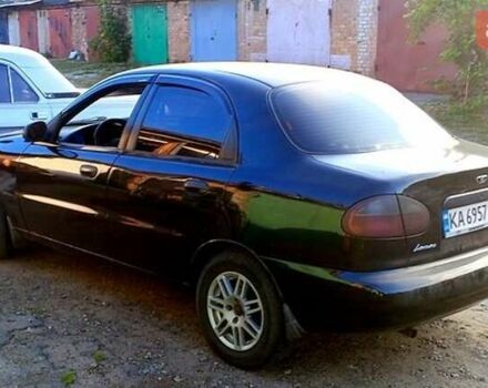 Черный Дэу Ланос, объемом двигателя 1.39 л и пробегом 233 тыс. км за 2200 $, фото 4 на Automoto.ua