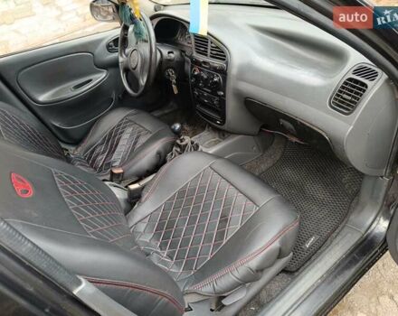 Черный Дэу Ланос, объемом двигателя 1.5 л и пробегом 200 тыс. км за 2100 $, фото 5 на Automoto.ua