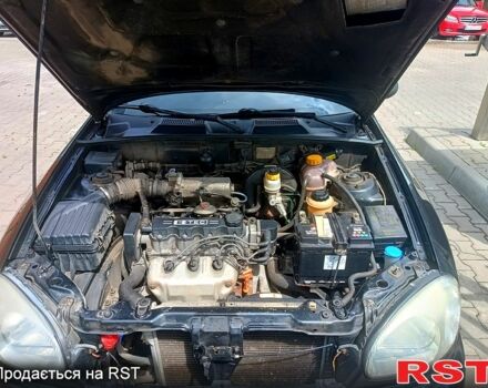 Черный Дэу Ланос, объемом двигателя 1.5 л и пробегом 173 тыс. км за 3200 $, фото 5 на Automoto.ua
