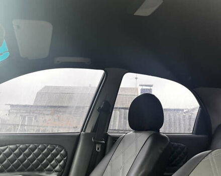 Черный Дэу Ланос, объемом двигателя 1.5 л и пробегом 200 тыс. км за 2000 $, фото 7 на Automoto.ua