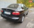 Черный Дэу Ланос, объемом двигателя 1.5 л и пробегом 351 тыс. км за 2000 $, фото 1 на Automoto.ua