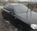Чорний Деу Ланос, об'ємом двигуна 1.5 л та пробігом 220 тис. км за 2000 $, фото 4 на Automoto.ua