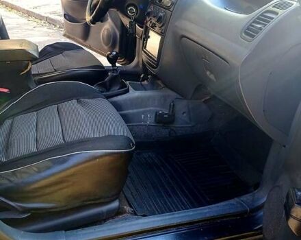 Черный Дэу Ланос, объемом двигателя 1.5 л и пробегом 365 тыс. км за 2000 $, фото 7 на Automoto.ua