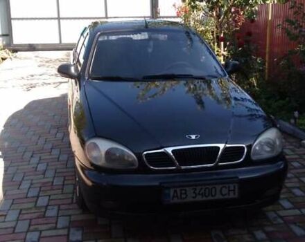 Черный Дэу Ланос, объемом двигателя 1.5 л и пробегом 156 тыс. км за 2000 $, фото 3 на Automoto.ua