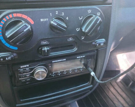 Чорний Деу Ланос, об'ємом двигуна 1.5 л та пробігом 136 тис. км за 2250 $, фото 4 на Automoto.ua