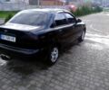 Черный Дэу Ланос, объемом двигателя 1.4 л и пробегом 230 тыс. км за 2800 $, фото 4 на Automoto.ua