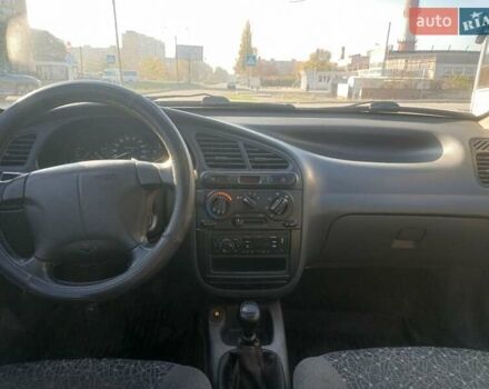 Чорний Деу Ланос, об'ємом двигуна 1.5 л та пробігом 184 тис. км за 3000 $, фото 3 на Automoto.ua