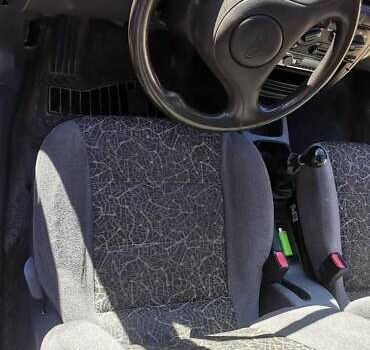 Черный Дэу Ланос, объемом двигателя 1.3 л и пробегом 160 тыс. км за 2000 $, фото 15 на Automoto.ua