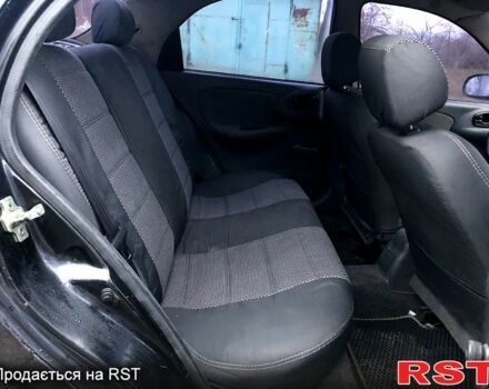 Чорний Деу Ланос, об'ємом двигуна 1.5 л та пробігом 198 тис. км за 1700 $, фото 5 на Automoto.ua