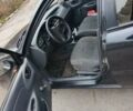 Черный Дэу Ланос, объемом двигателя 1.5 л и пробегом 240 тыс. км за 1800 $, фото 1 на Automoto.ua