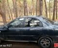 Черный Дэу Ланос, объемом двигателя 1.4 л и пробегом 234 тыс. км за 1600 $, фото 3 на Automoto.ua
