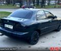 Черный Дэу Ланос, объемом двигателя 1.5 л и пробегом 194 тыс. км за 1999 $, фото 2 на Automoto.ua