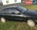 Чорний Деу Ланос, об'ємом двигуна 1.6 л та пробігом 93 тис. км за 2800 $, фото 1 на Automoto.ua