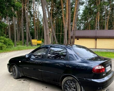 Черный Дэу Ланос, объемом двигателя 1.4 л и пробегом 245 тыс. км за 1700 $, фото 2 на Automoto.ua