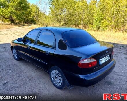 Черный Дэу Ланос, объемом двигателя 1.6 л и пробегом 160 тыс. км за 2700 $, фото 1 на Automoto.ua