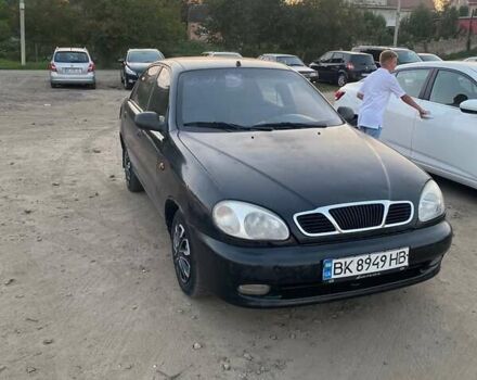 Чорний Деу Ланос, об'ємом двигуна 1.39 л та пробігом 312 тис. км за 900 $, фото 2 на Automoto.ua