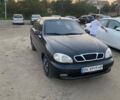 Чорний Деу Ланос, об'ємом двигуна 1.39 л та пробігом 312 тис. км за 900 $, фото 2 на Automoto.ua