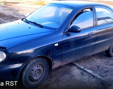 Черный Дэу Ланос, объемом двигателя 1.6 л и пробегом 269 тыс. км за 1300 $, фото 5 на Automoto.ua