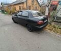 Черный Дэу Ланос, объемом двигателя 1.5 л и пробегом 300 тыс. км за 1500 $, фото 12 на Automoto.ua