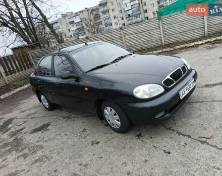 Черный Дэу Ланос, объемом двигателя 1.5 л и пробегом 240 тыс. км за 1800 $, фото 3 на Automoto.ua