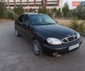 Черный Дэу Ланос, объемом двигателя 1.6 л и пробегом 275 тыс. км за 3350 $, фото 1 на Automoto.ua