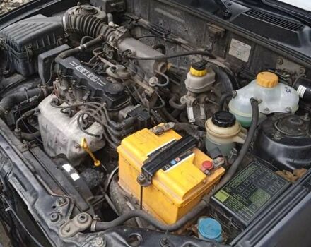 Черный Дэу Ланос, объемом двигателя 1.5 л и пробегом 197 тыс. км за 2500 $, фото 15 на Automoto.ua