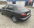 Черный Дэу Ланос, объемом двигателя 1.6 л и пробегом 170 тыс. км за 2400 $, фото 2 на Automoto.ua