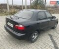 Черный Дэу Ланос, объемом двигателя 1.6 л и пробегом 170 тыс. км за 2400 $, фото 7 на Automoto.ua