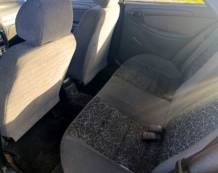 Деу Ланос 2009 у Жашкове на Automoto.ua Чорний Деу Ланос, об'ємом двигуна 1.5 л та пробігом 313 тис. км за 1650 $, фото 7 на Automoto.ua