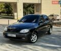 Черный Дэу Ланос, объемом двигателя 1.5 л и пробегом 230 тыс. км за 2500 $, фото 1 на Automoto.ua