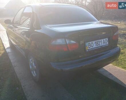 Черный Дэу Ланос, объемом двигателя 1.5 л и пробегом 76 тыс. км за 2300 $, фото 7 на Automoto.ua