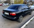 Черный Дэу Ланос, объемом двигателя 1.6 л и пробегом 326 тыс. км за 2700 $, фото 10 на Automoto.ua