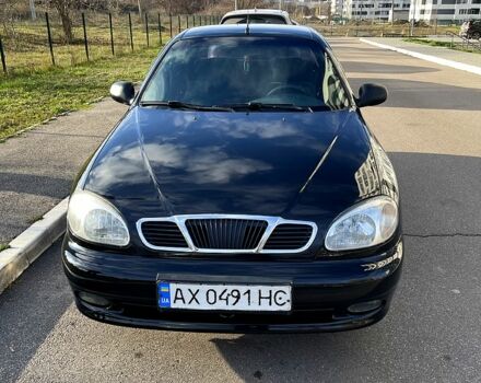 Черный Дэу Ланос, объемом двигателя 1.6 л и пробегом 326 тыс. км за 2700 $, фото 3 на Automoto.ua