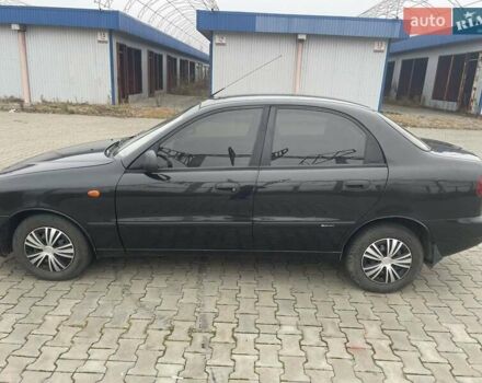 Черный Дэу Ланос, объемом двигателя 1.6 л и пробегом 170 тыс. км за 2400 $, фото 3 на Automoto.ua