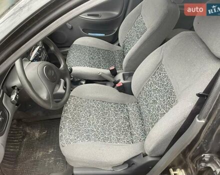 Черный Дэу Ланос, объемом двигателя 1.6 л и пробегом 170 тыс. км за 2400 $, фото 11 на Automoto.ua