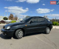 Черный Дэу Ланос, объемом двигателя 1.5 л и пробегом 140 тыс. км за 2650 $, фото 1 на Automoto.ua