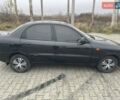 Черный Дэу Ланос, объемом двигателя 1.6 л и пробегом 170 тыс. км за 2400 $, фото 6 на Automoto.ua
