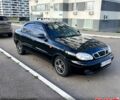 Черный Дэу Ланос, объемом двигателя 1.6 л и пробегом 326 тыс. км за 2700 $, фото 2 на Automoto.ua