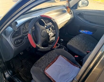 Деу Ланос 2009 у Жашкове на Automoto.ua Чорний Деу Ланос, об'ємом двигуна 1.5 л та пробігом 313 тис. км за 1650 $, фото 6 на Automoto.ua