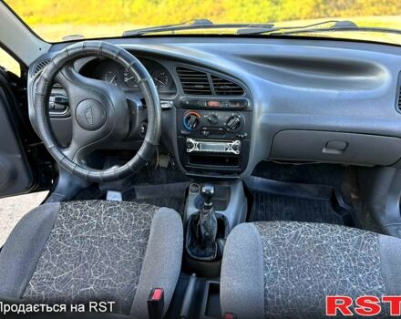 Черный Дэу Ланос, объемом двигателя 1.5 л и пробегом 162 тыс. км за 3100 $, фото 5 на Automoto.ua