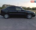 Черный Дэу Ланос, объемом двигателя 1.6 л и пробегом 275 тыс. км за 3350 $, фото 1 на Automoto.ua
